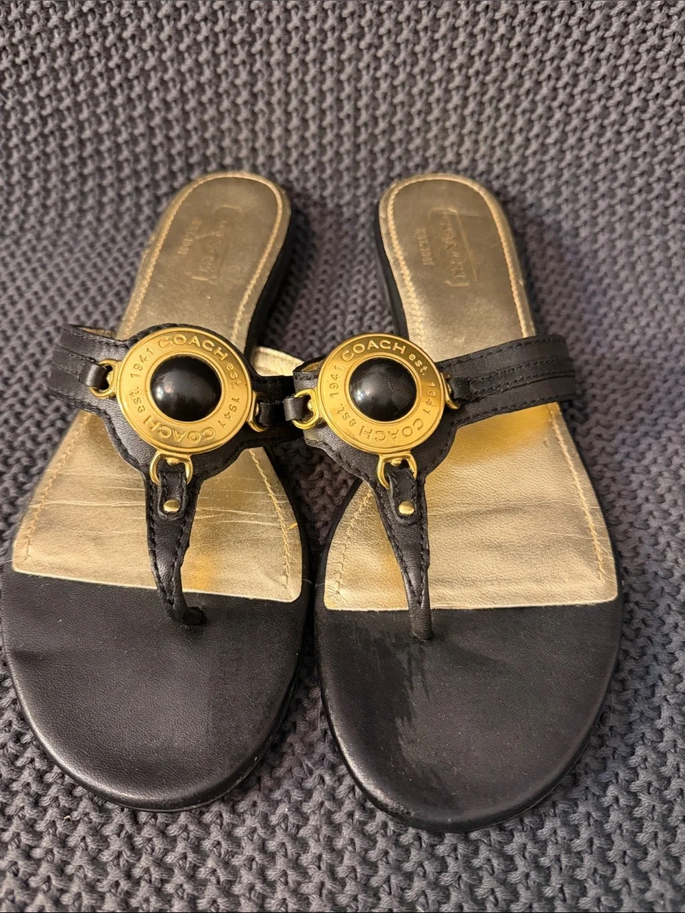 Coach Black Leather Thong Sandals with Gold Medallion